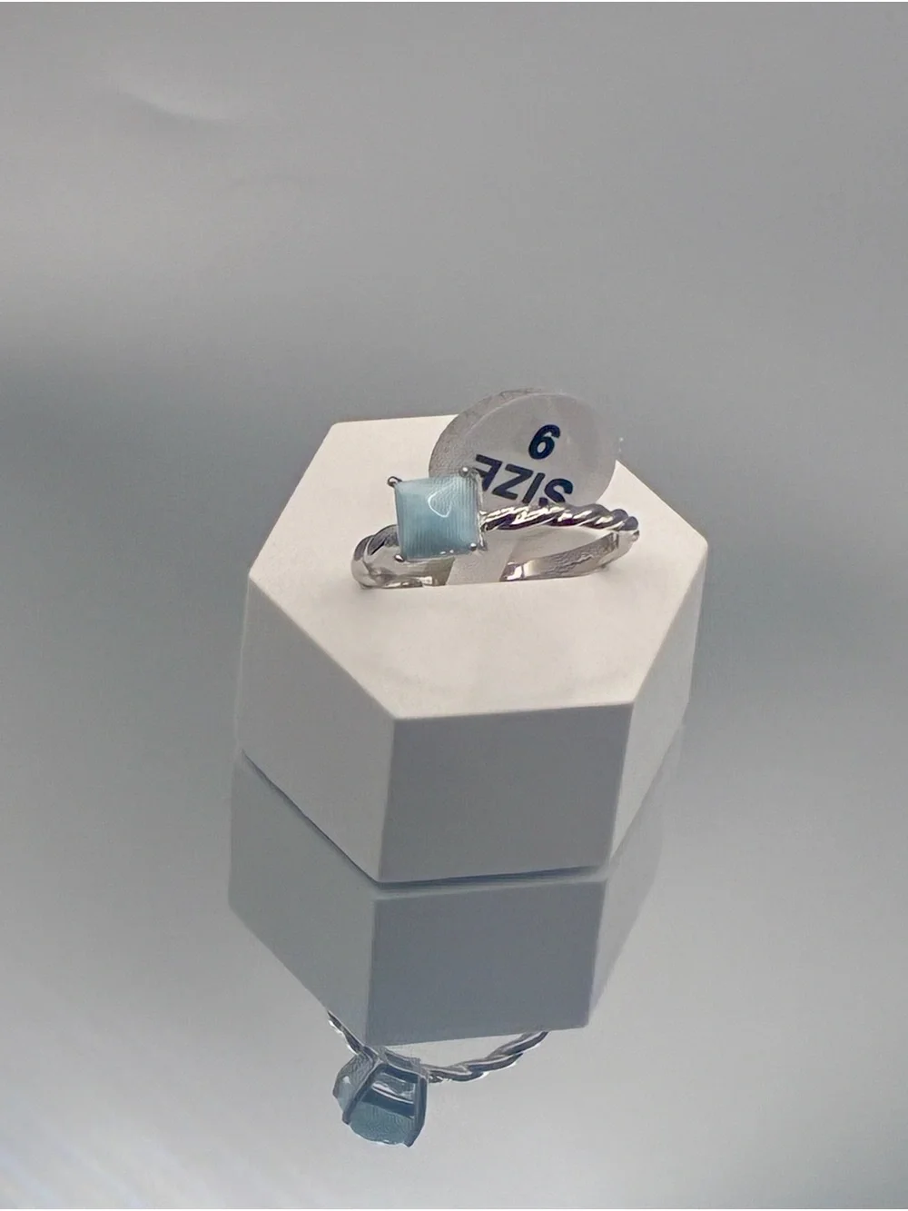 Sterling Silver Ring with Light Blue Square Gemstone and Twisted Band
